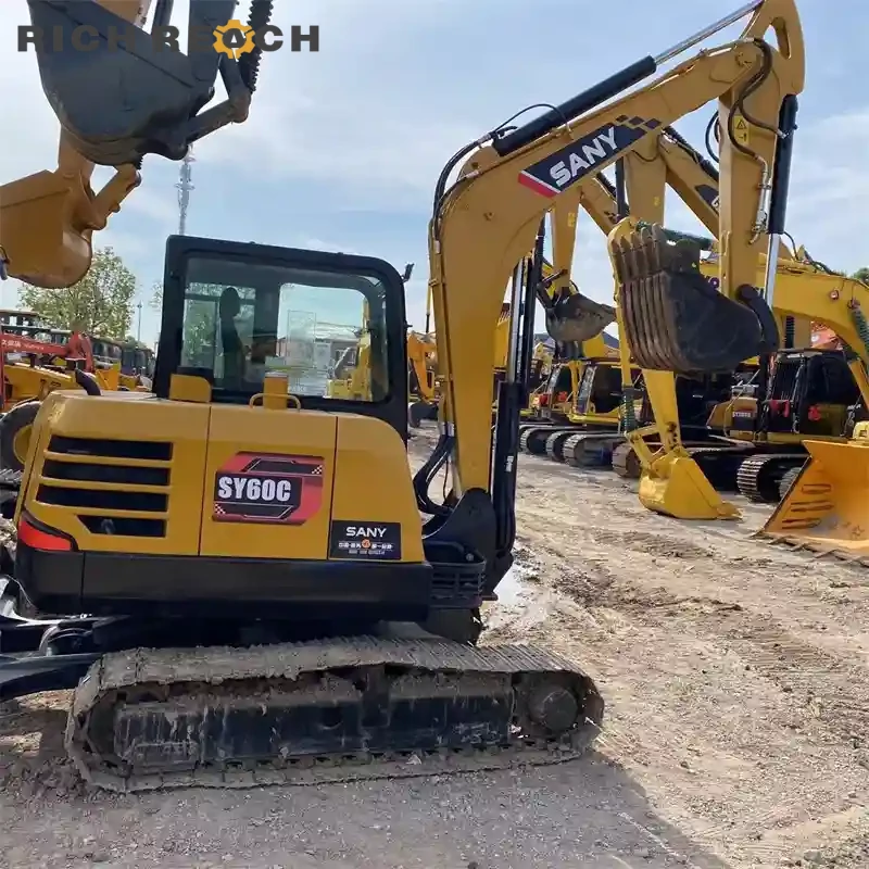 Front three-quarter view of used Sany 60C mini excavator, low hour machine for landscaping