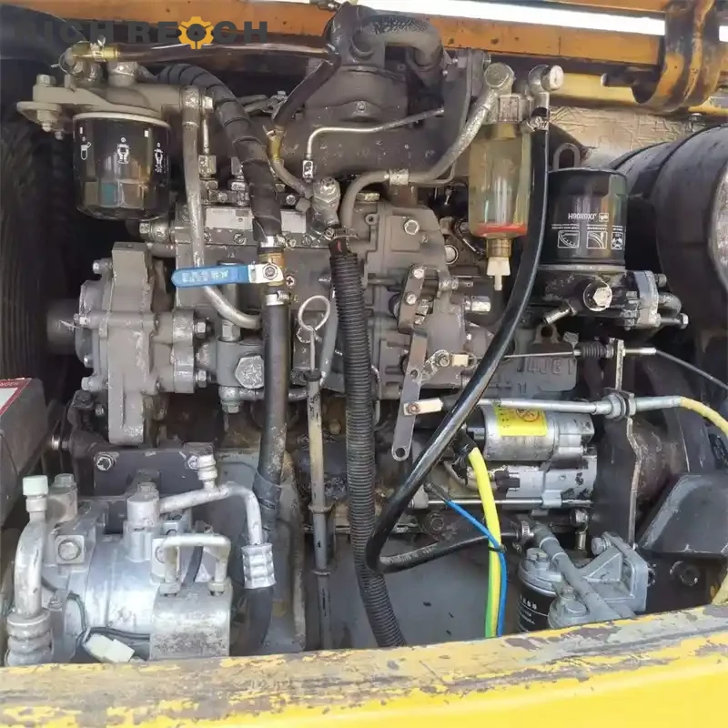 Simple instrument panel and switches inside a used Sany 75C-9 mini excavator – operator-friendly layout