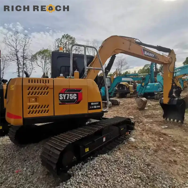 Battery and isolator switch on a used Sany 75C excavator – clean engine bay, well maintained, USD pricing