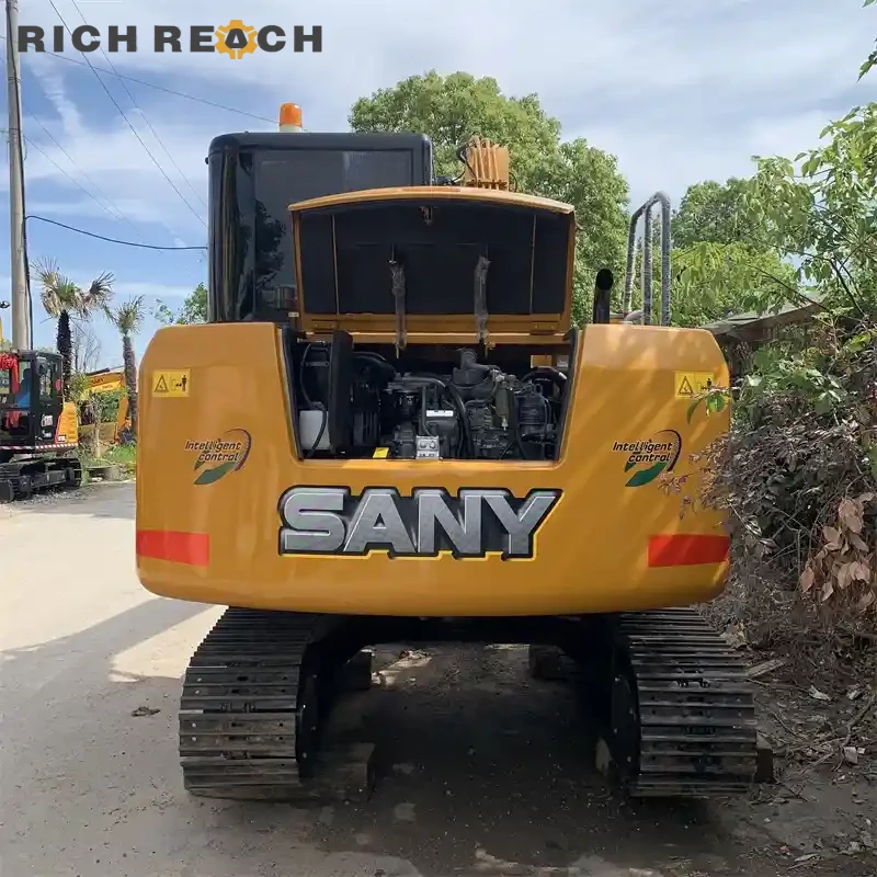 Blade cutting edge and wear strip of a used Sany SY75C – low hours, good undercarriage condition, affordable