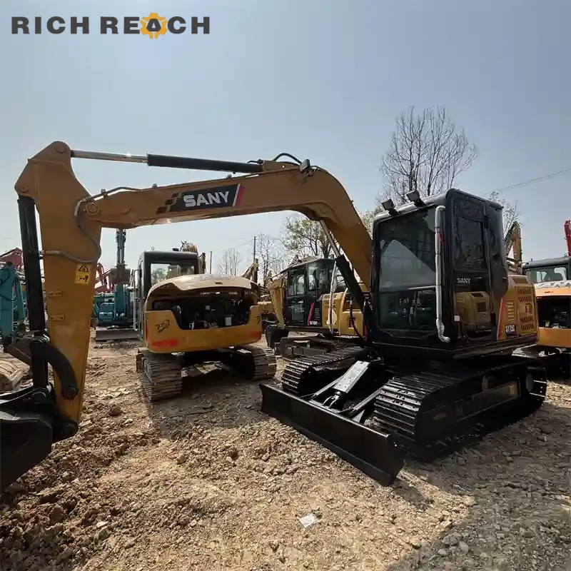 Bottom rollers and track guard of a used Sany SY75C – low wear, great condition, all prices in USD