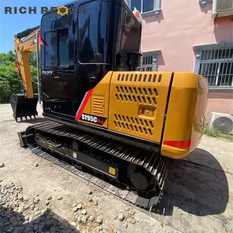 Used Sany 95C Pro excavator excavating a deep trench, demonstrating high digging force