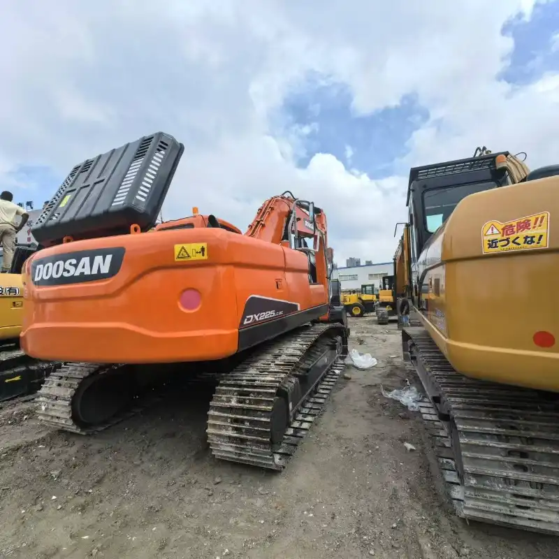 Engine compartment of a used DX225LC-9 excavator with low hours and special promotion