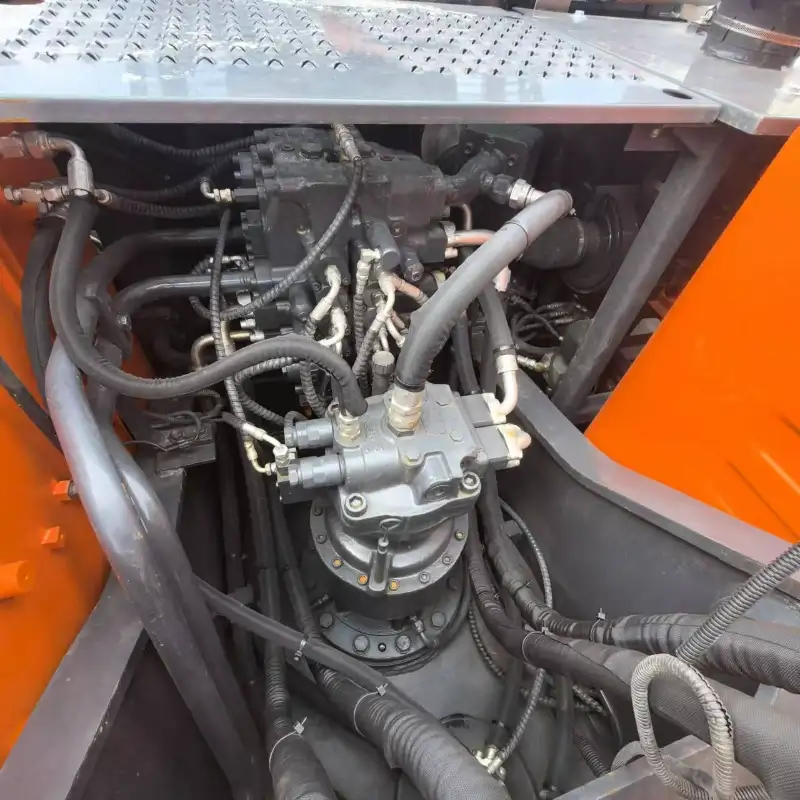 Undercarriage and tracks of a used DX225LC-9 excavator with limited time special offer