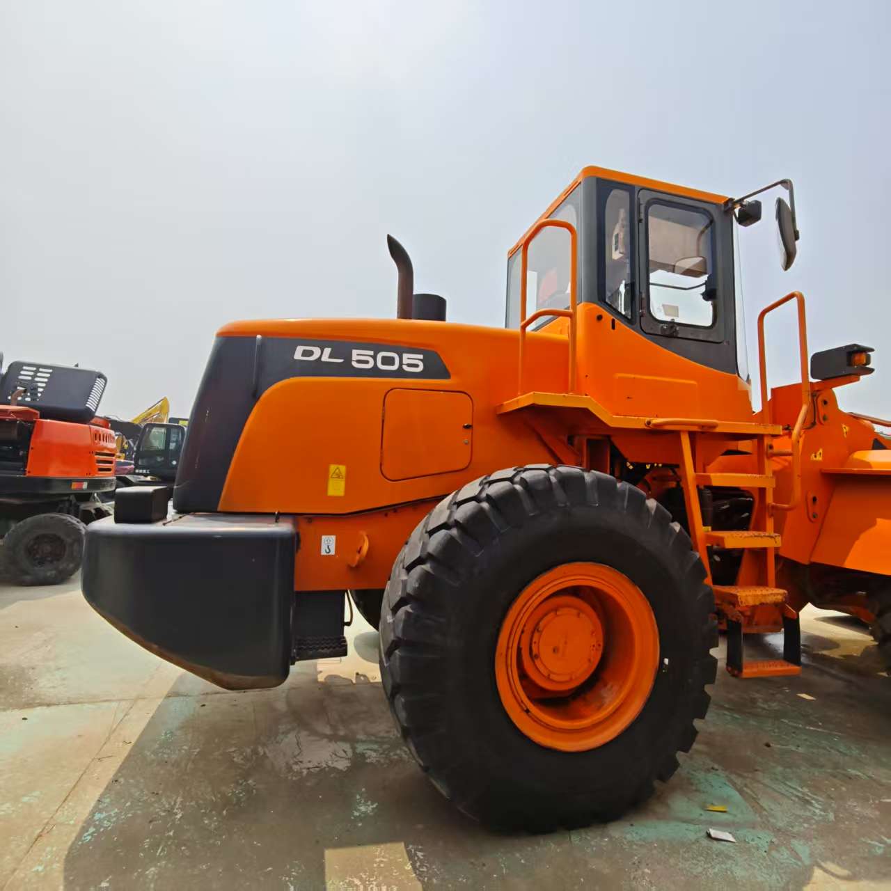 doosan dl505 cab interior pilot joystick controls