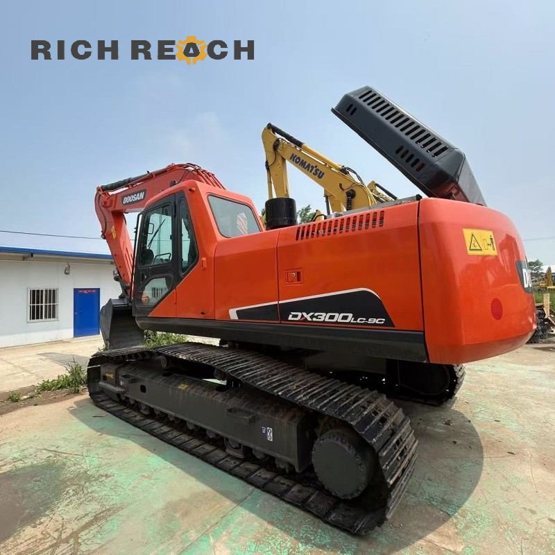 Undercarriage and dozer blade of a used 2023 Doosan DX300LC-9C excavator – price on request