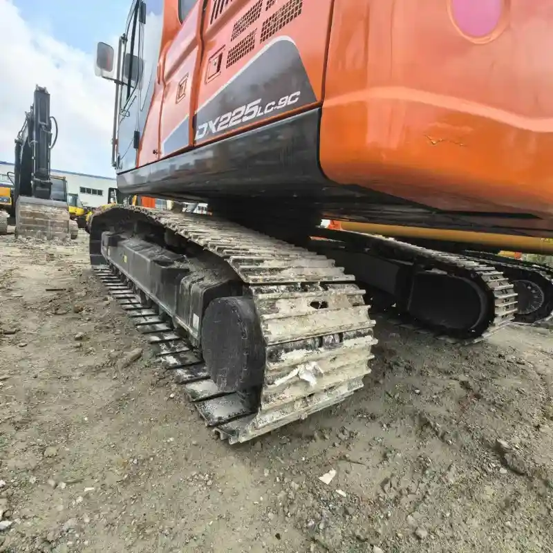 Side view of a used DX225LC-9 heavy equipment excavator for sale with hot deal