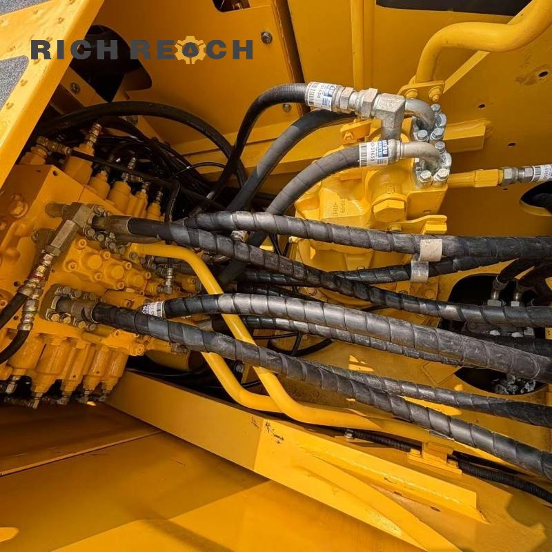 Cab interior and control panel of a 2018 Komatsu PC240LC excavator, low hours, priced at $34,722
