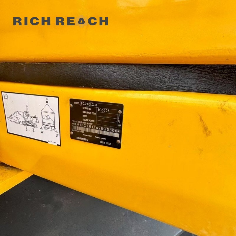 Engine top view and components of a 2018 Komatsu PC240LC excavator, low hours, priced at $34,722