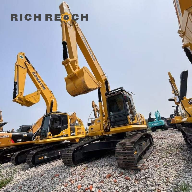 Front view with boom and bucket cylinder of a 2018 Komatsu PC240LC excavator, low hours, $34,722