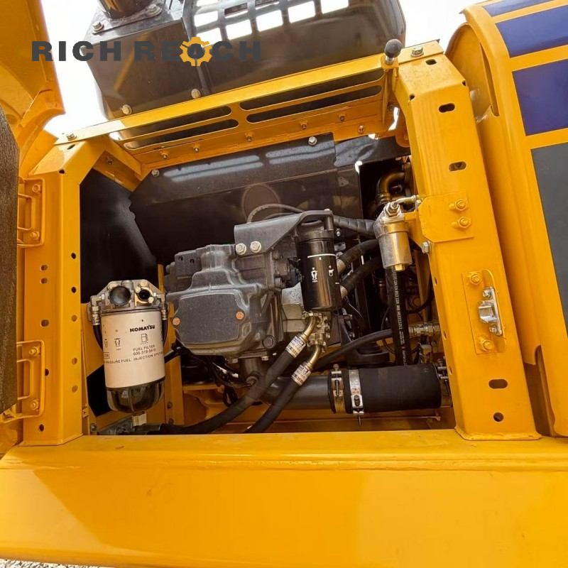 Hour meter display showing low hours on a 2018 Komatsu PC240LC excavator, priced at $34,722