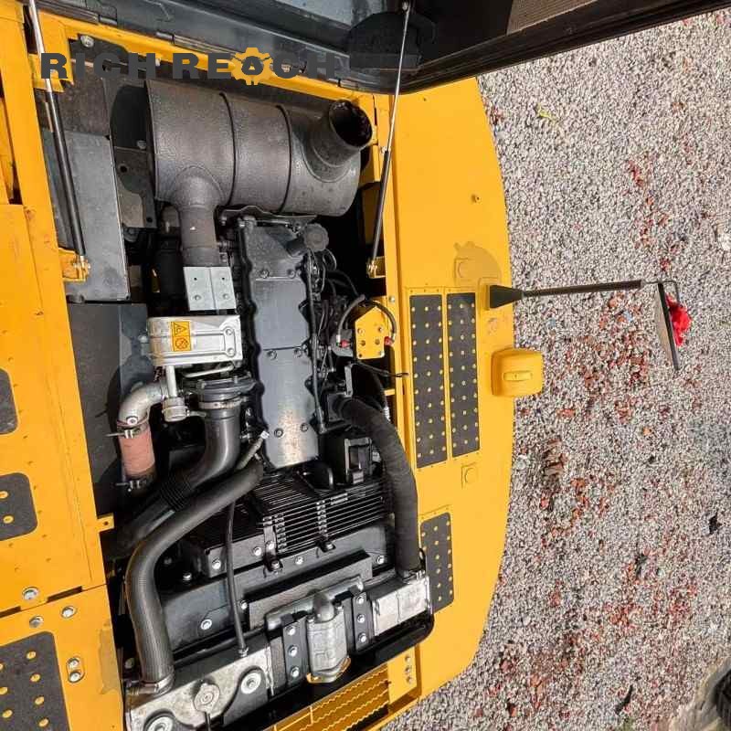 Rear view with counterweight and engine door of a 2018 Komatsu PC240LC excavator, low hours, $34,722