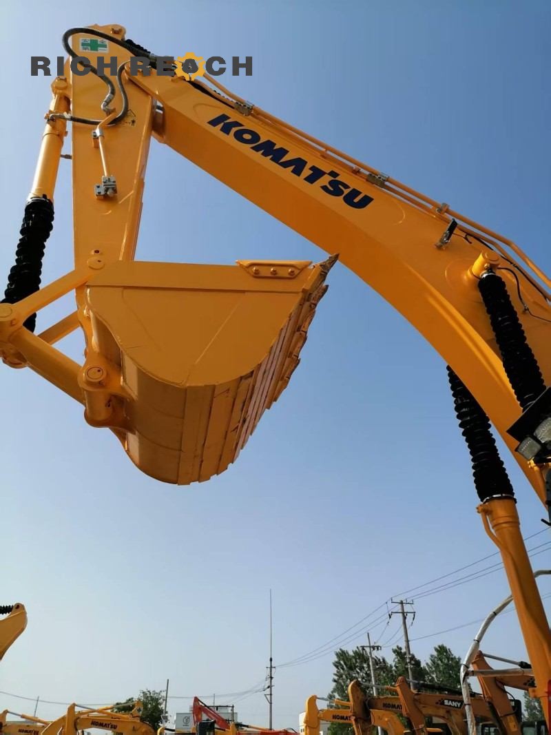 Reinforced undercarriage and track shoes of a used Komatsu PC350 excavator | Price on request
