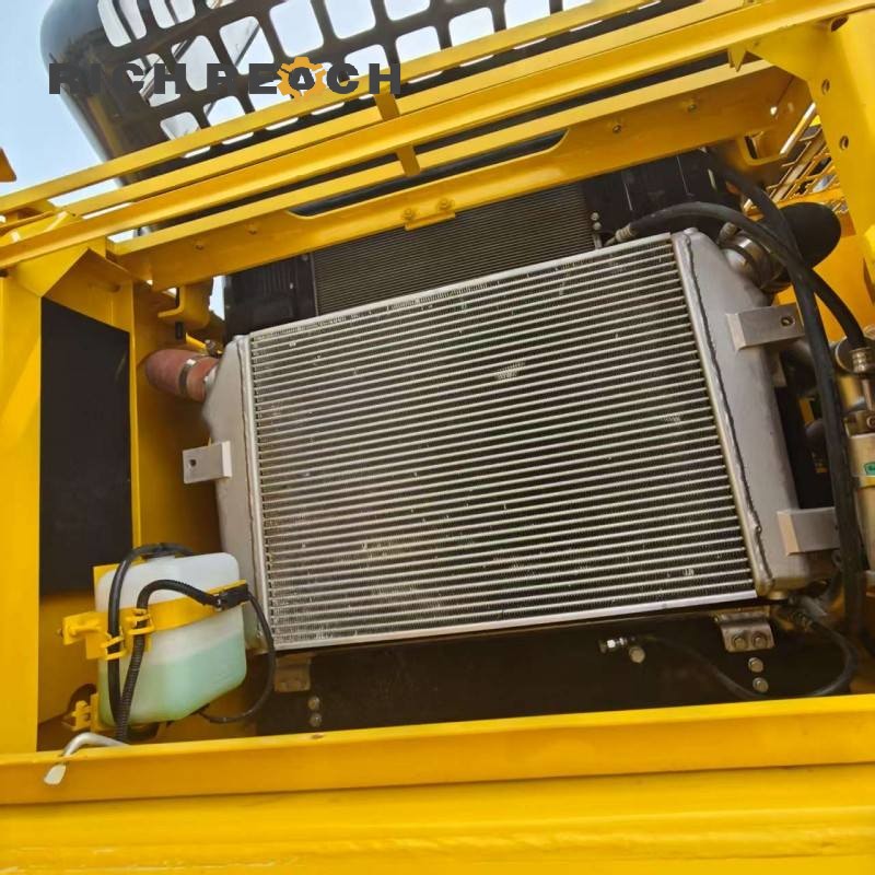 Engine compartment of a 2015 Komatsu PC360-7 excavator with 2,700 hours, priced at $37,500