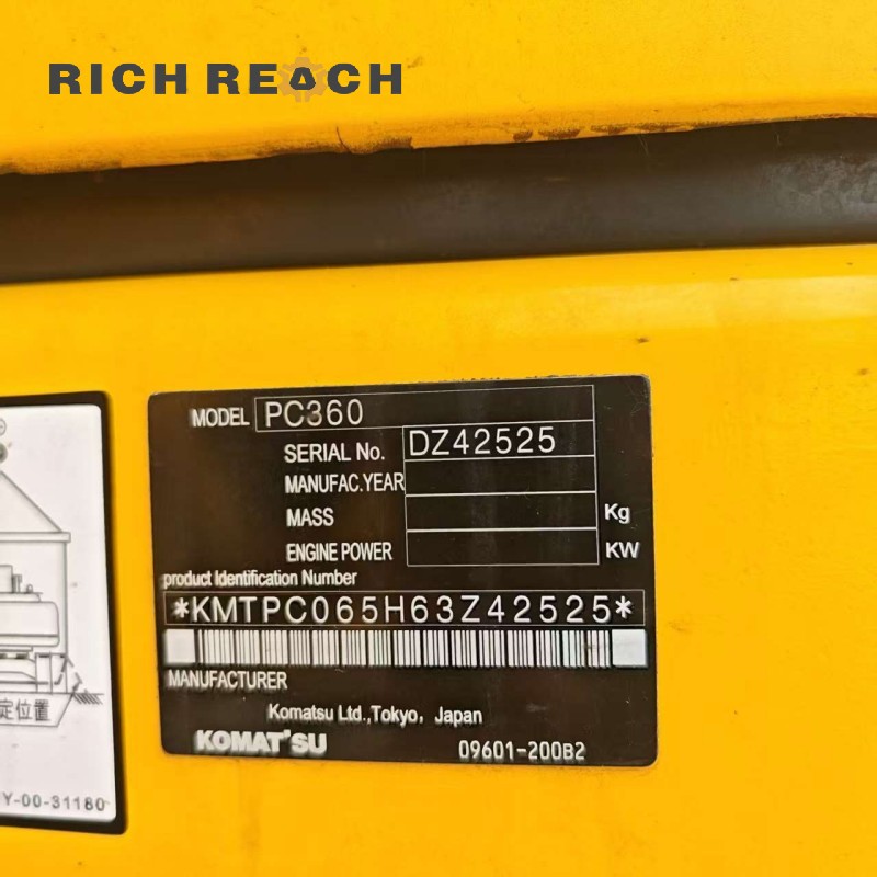 Undercarriage and track shoes of a 2015 Komatsu PC360-7 excavator with 2,700 hours, priced at $37,500
