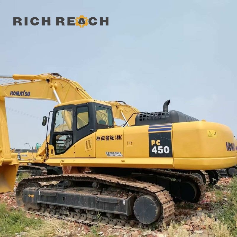Left side view of a used Komatsu PC450-2 excavator – robust undercarriage, price on request