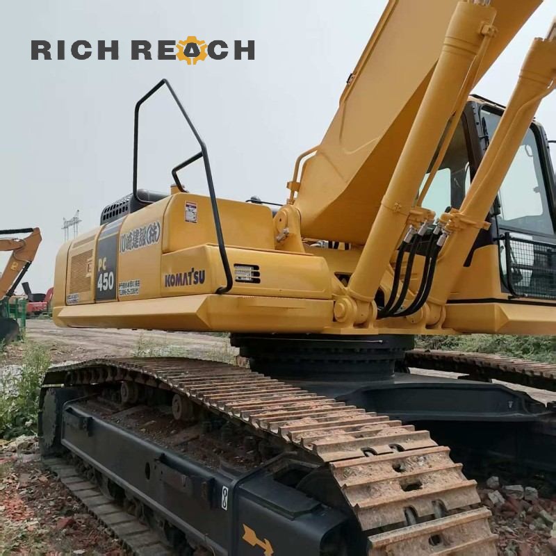 Engine compartment of a used Komatsu PC450-3 hydraulic excavator, second hand machine, price on request