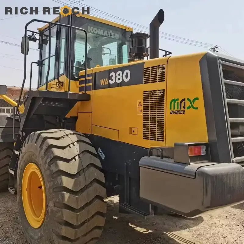 Komatsu WA380-6 backhoe excavator side view showing rear digging arm and front loader by Richreach