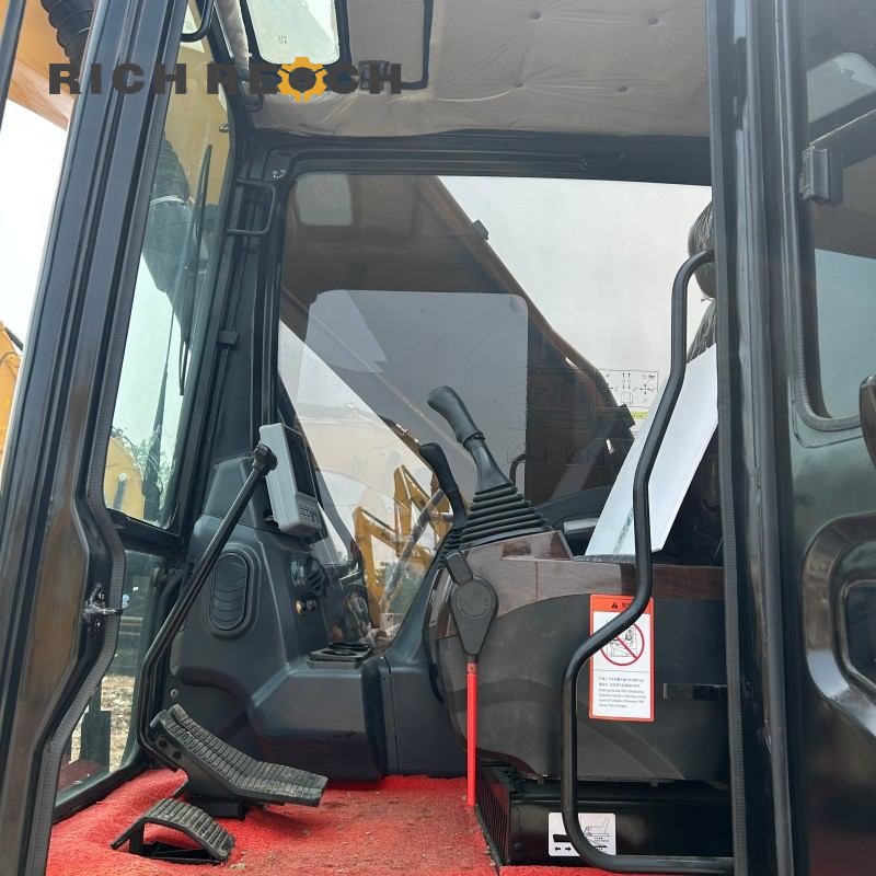 Operator cab with air conditioning and joysticks of a 2023 SANY 215C excavator, $30,556