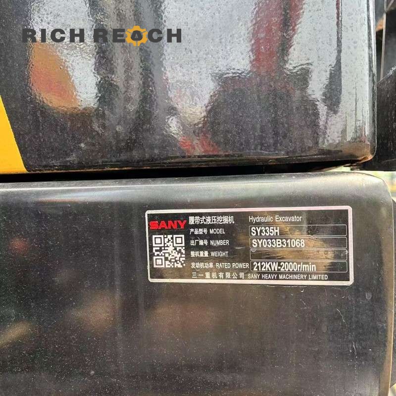 Cab control panel and joysticks of a 2020 SANY 335H excavator, low hours, priced at $37,500