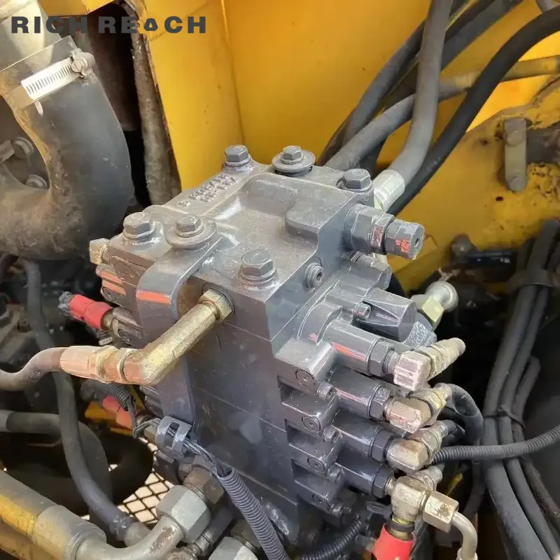 Used Komatsu PC78 excavator working on construction site – real action photo